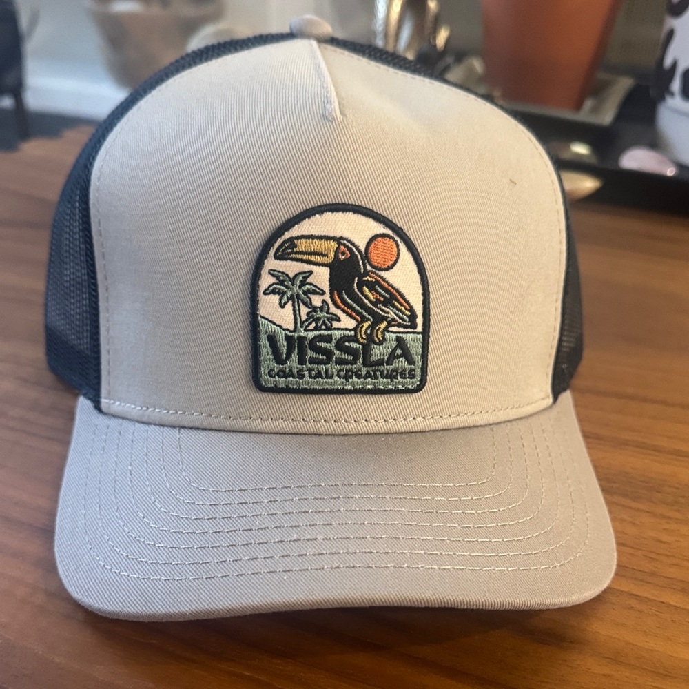 VISSLA Beige and Black Trucker Hat with Toucan Patch